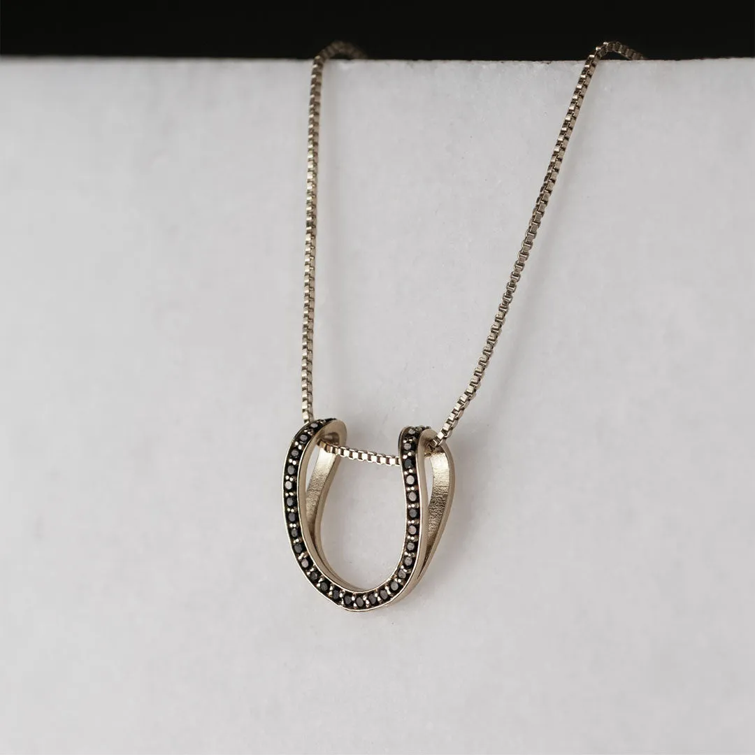 Levade - Black Moisannite Stones and Sterling Silver Horseshoe Necklace