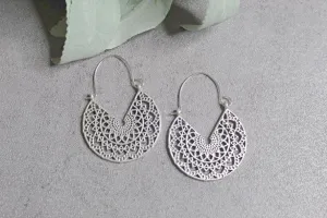 Silvertone earrings with scrolling details