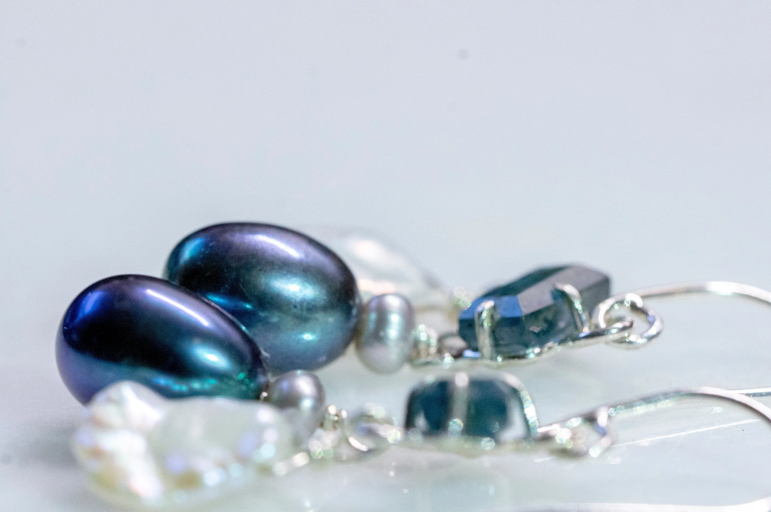 Sterling silver pearl mobile earrings