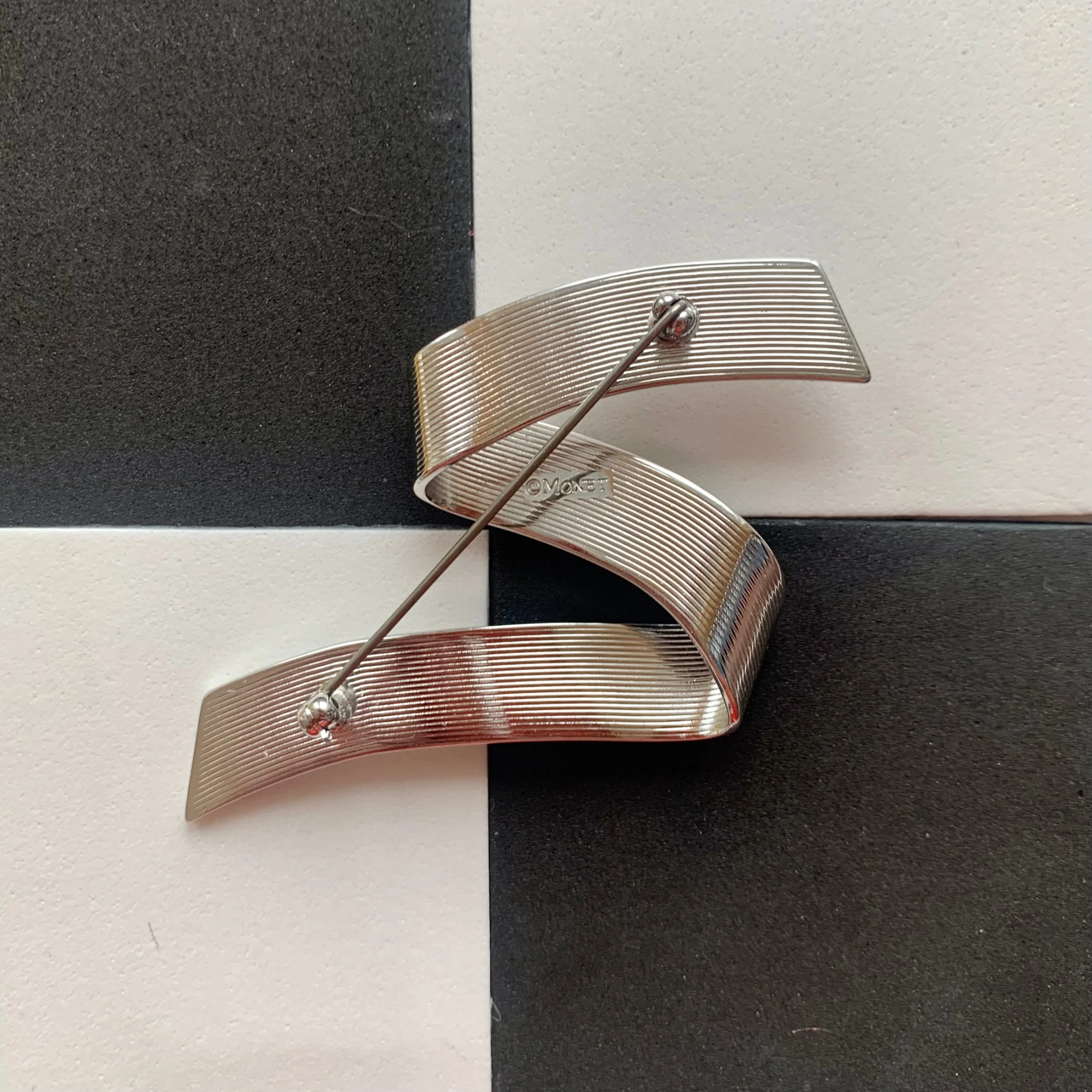 Vintage Monet Silver-Toned Ribbon Brooch